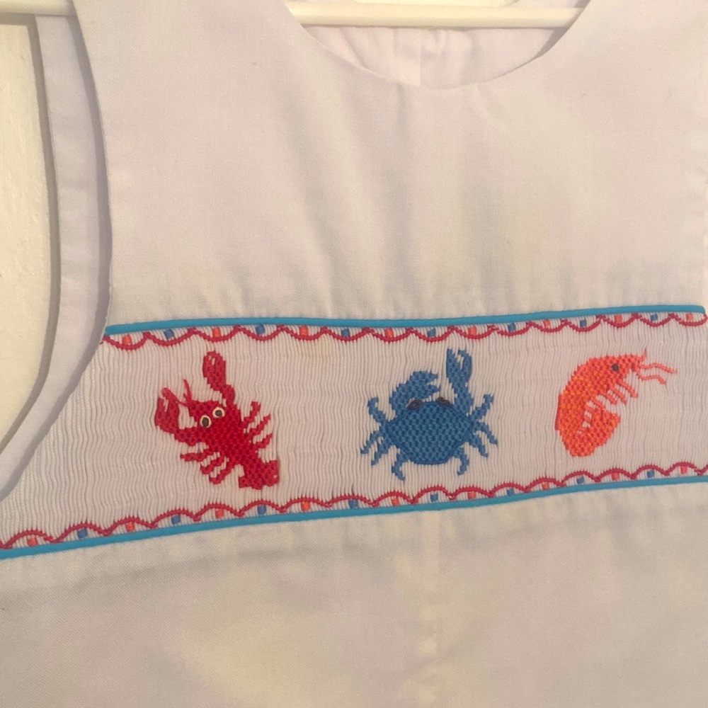 Boys White Shortall with Shellfish Smocking.